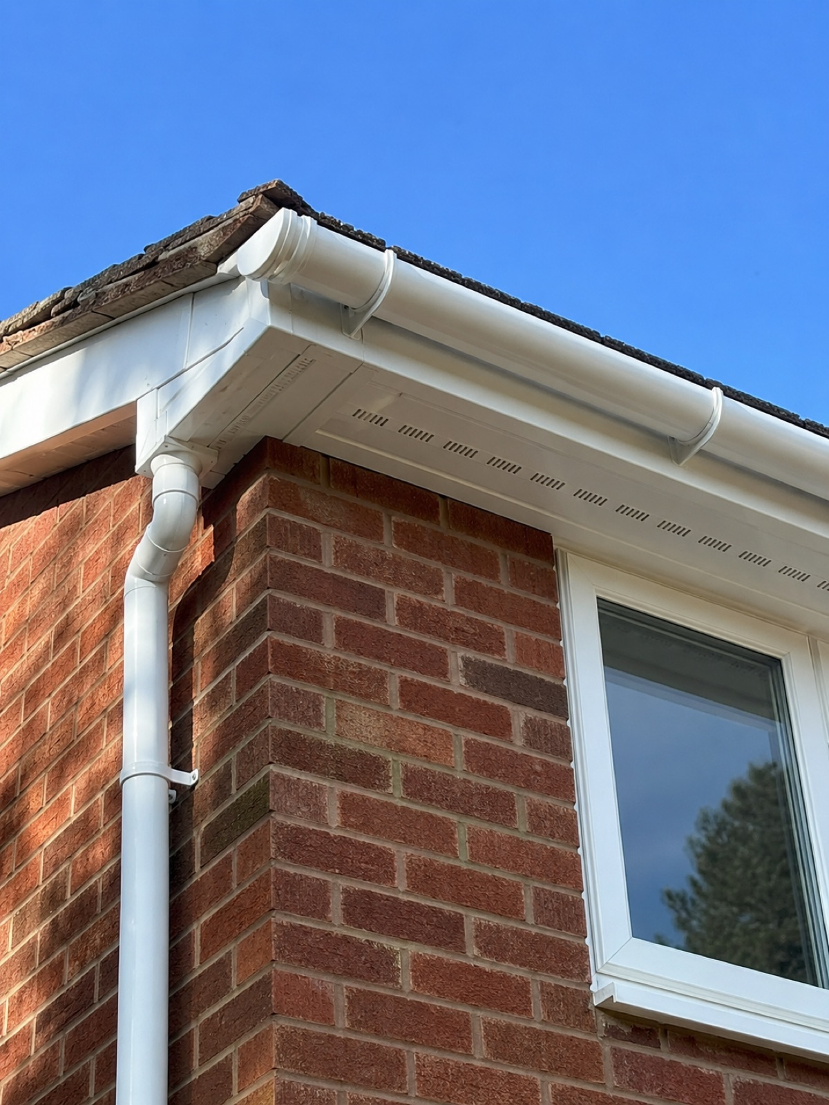 White uPVC fascia, soffit and guttering on a residential elevation