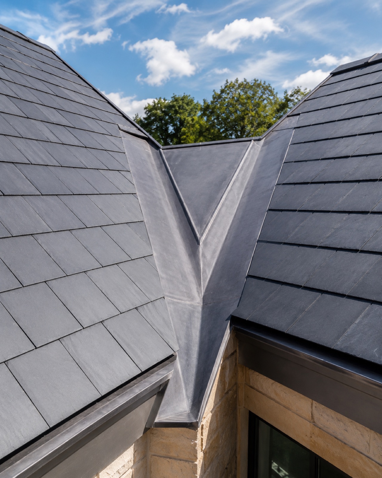 Code 5 lead used at a chimney back gutter and valley detail