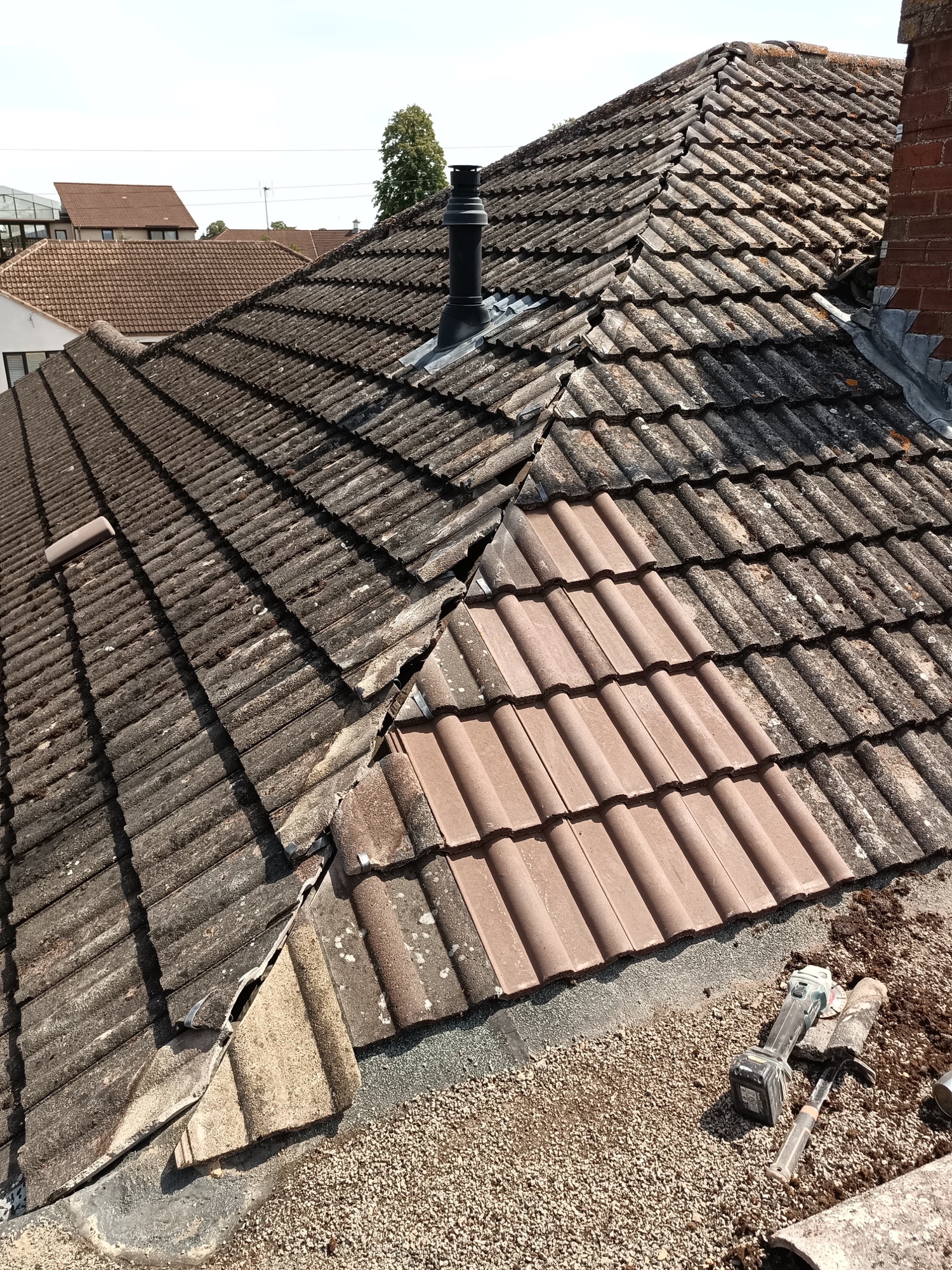 Bletchley hip tiles rebedded in fresh mortar