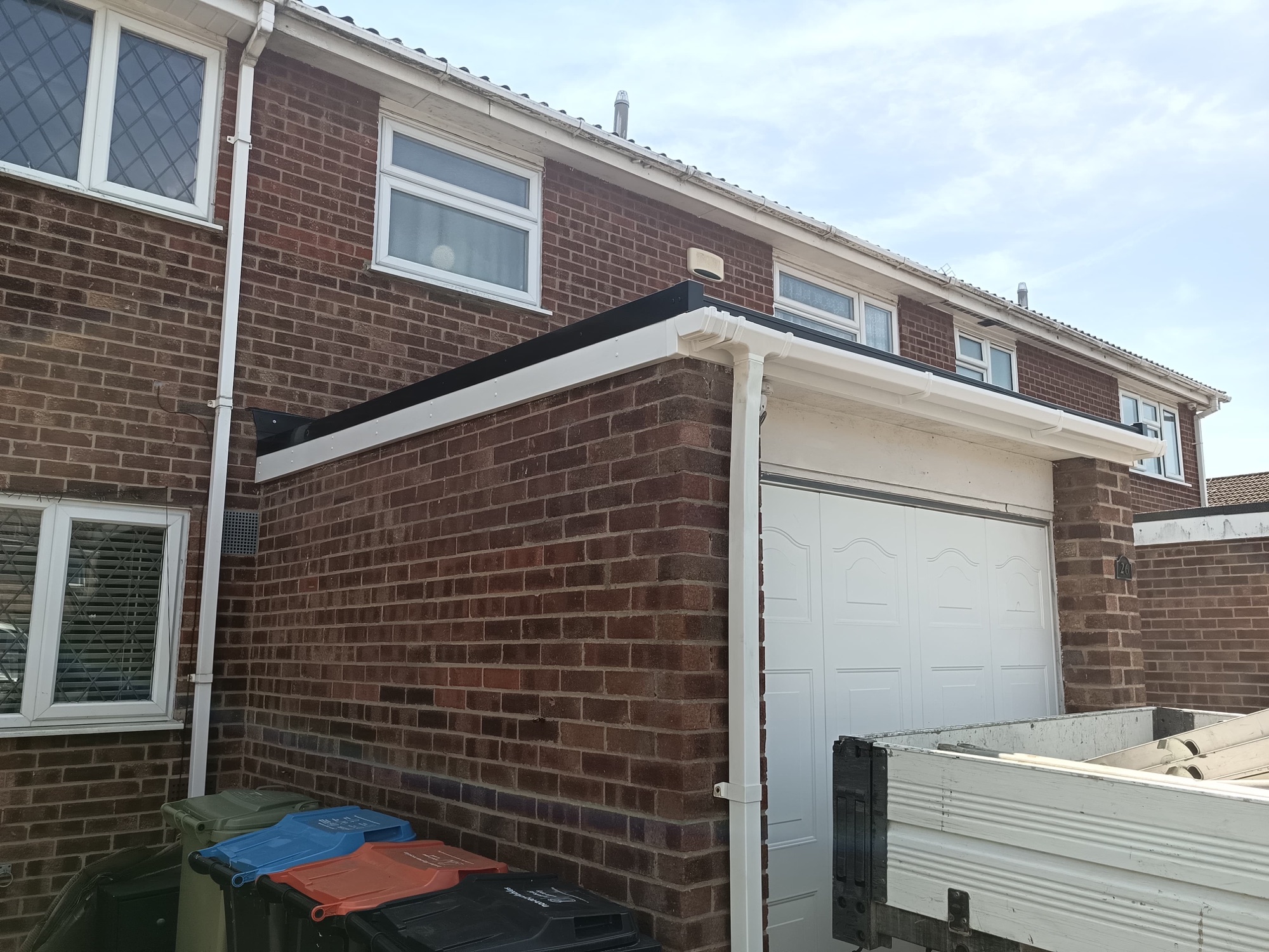 Flat roof deck re-boarded throughout