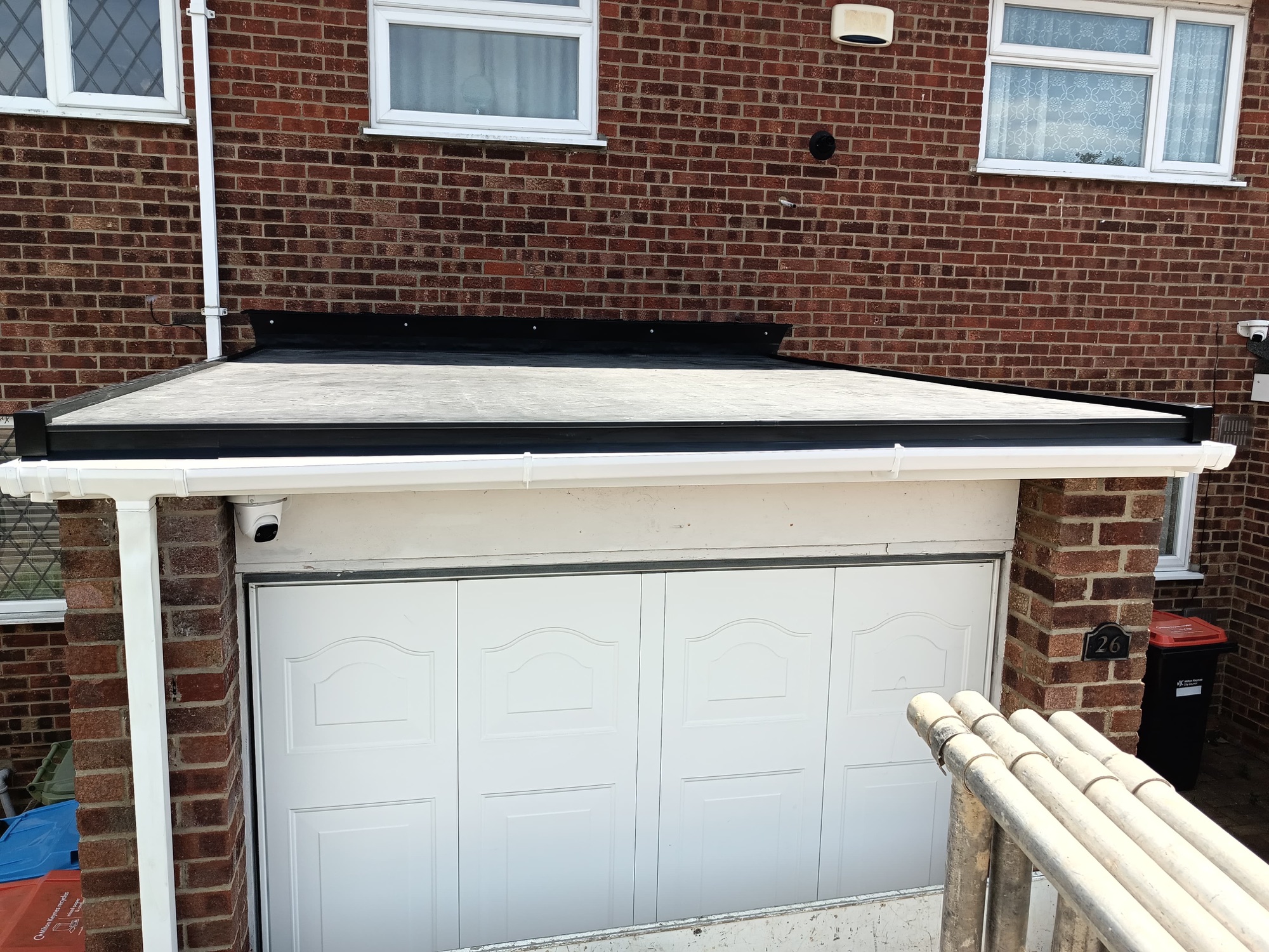 Fresh treated timber to a flat roof edge