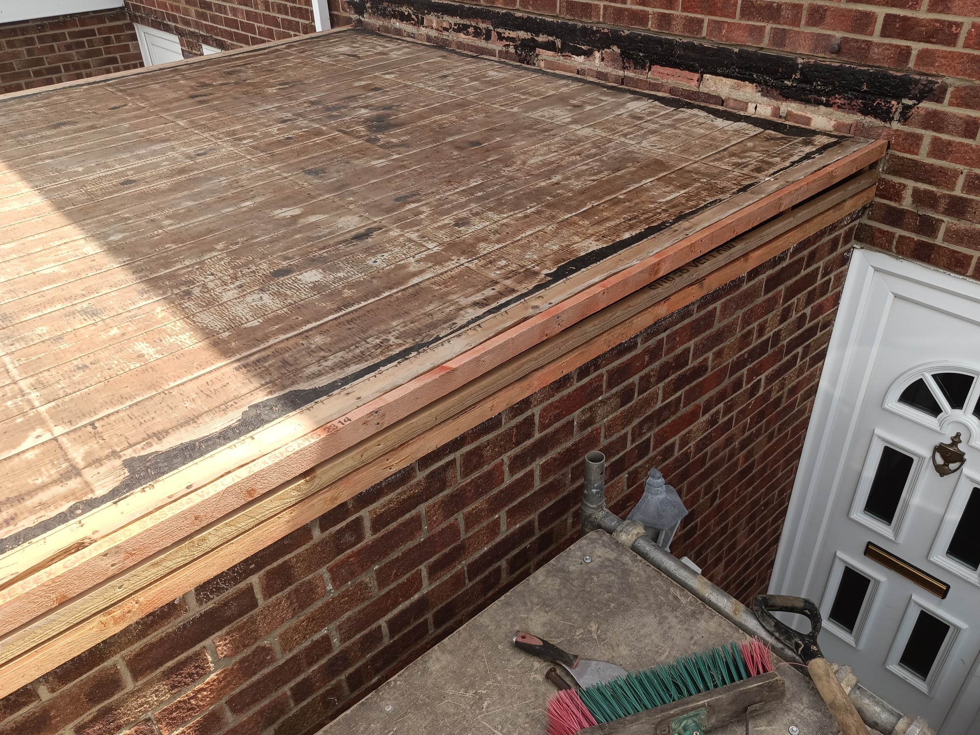 Foxgate flat roof re-boarded with a fresh timber deck