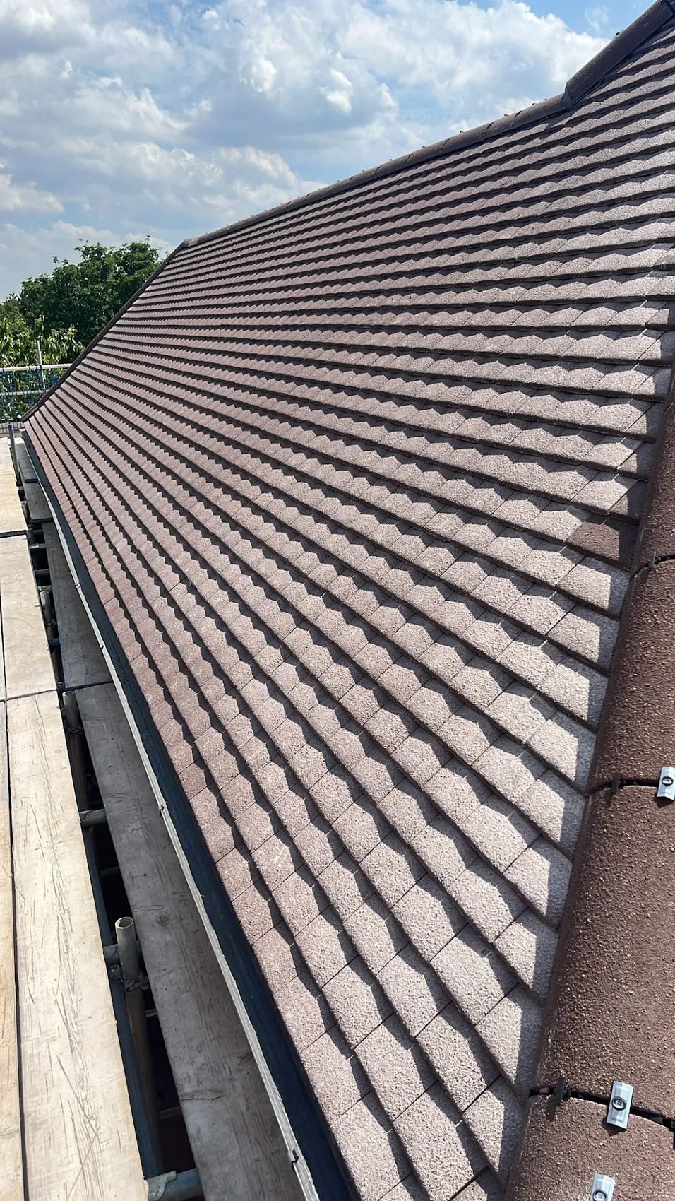 Dry-fix hip and ridge detail on a hipped roof