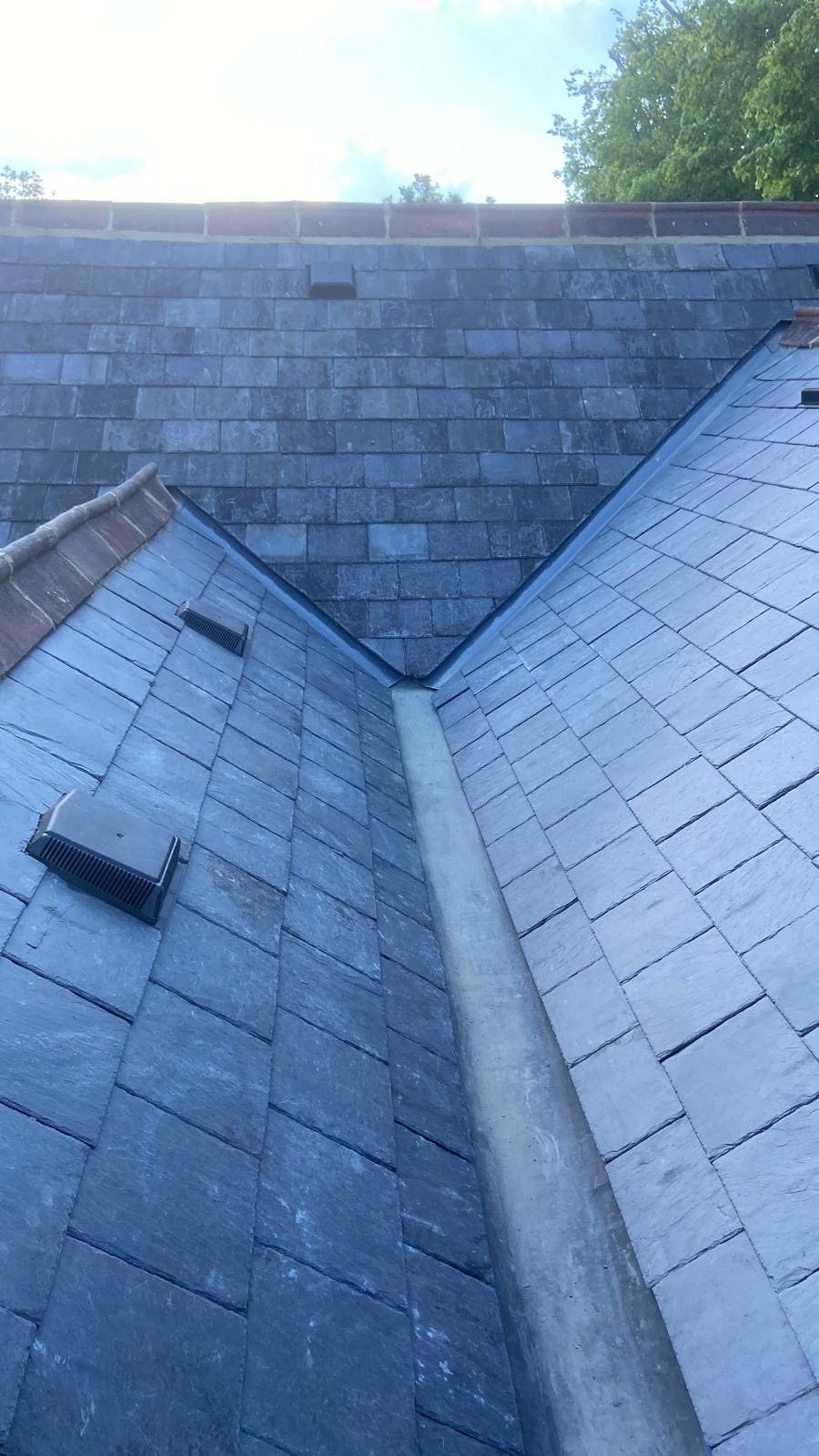 Lead valley running between two slopes of finished reclaimed slate