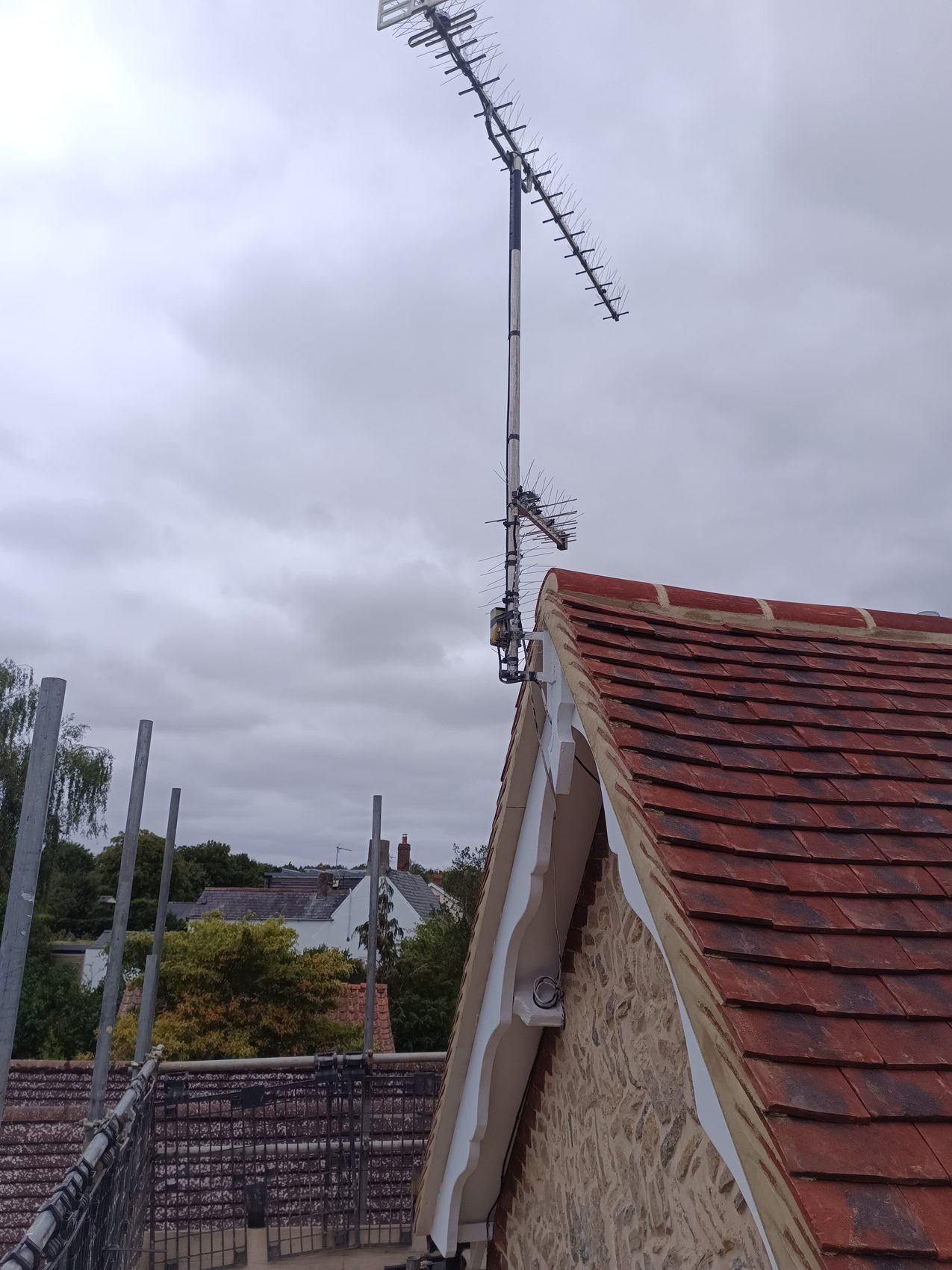 Gable elevation of the finished roof against the sky