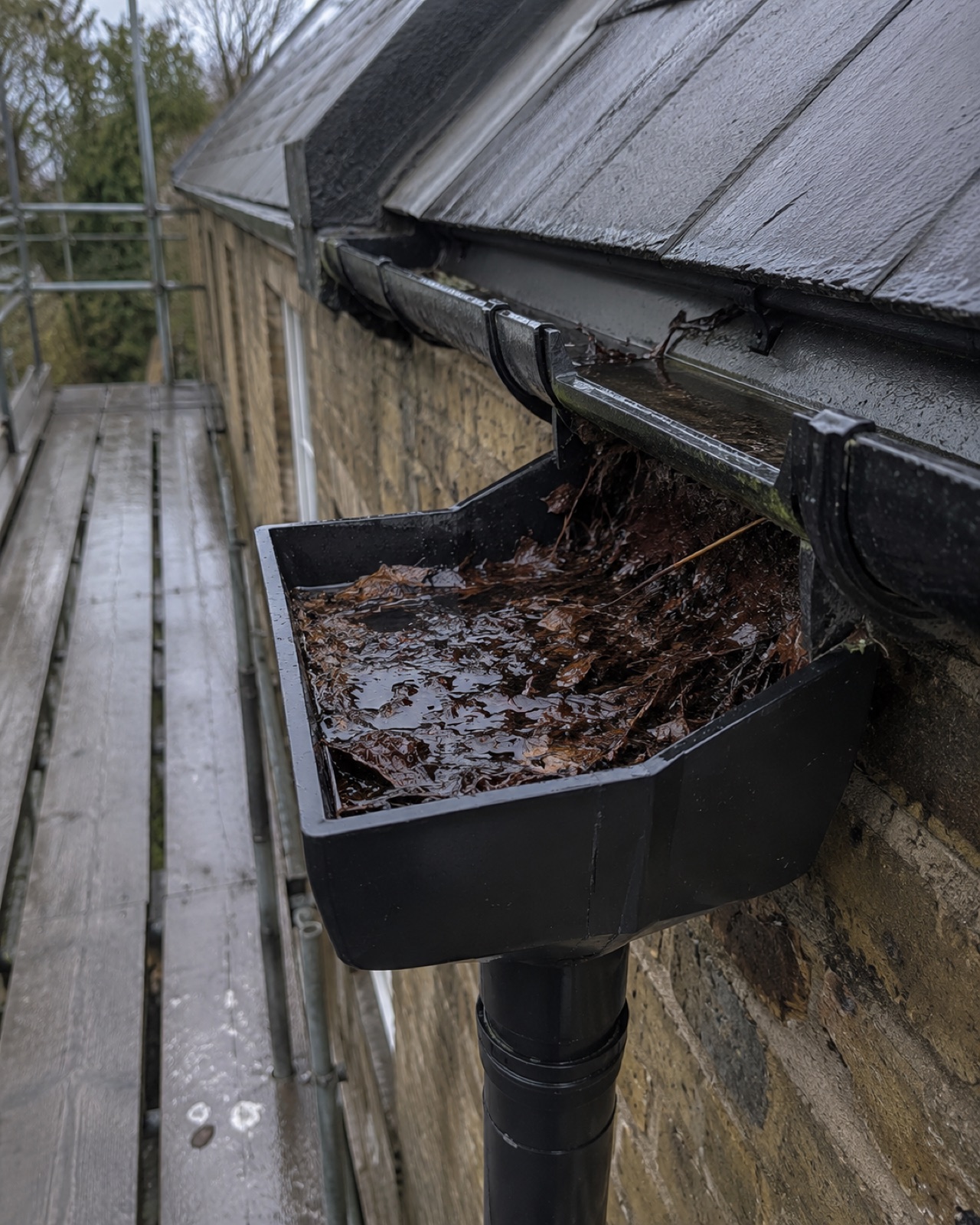 Blocked hopper overflowing during rainfall