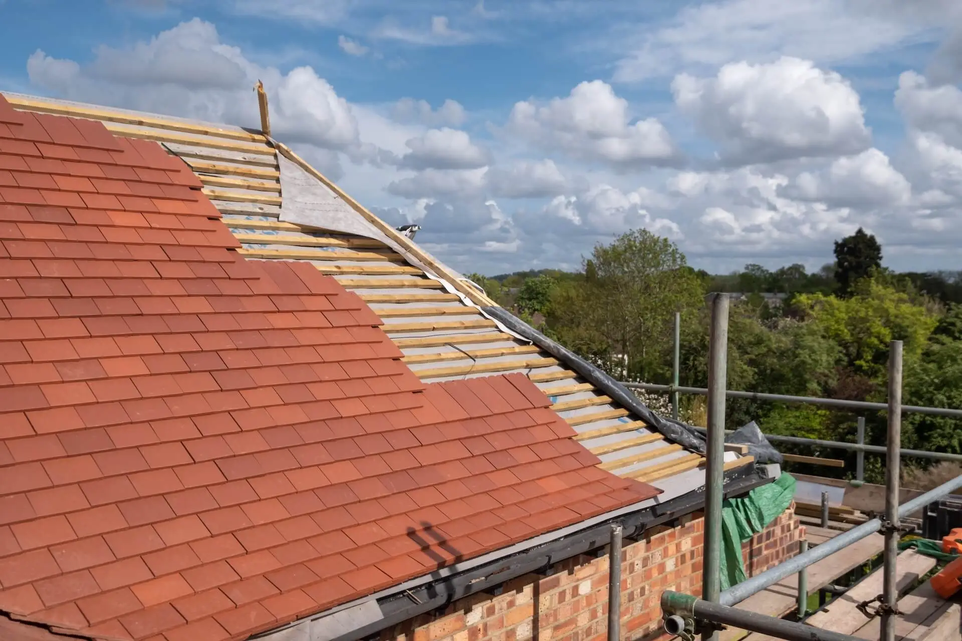 Leaking flashing kit around a Velux window on a pitched tile roof